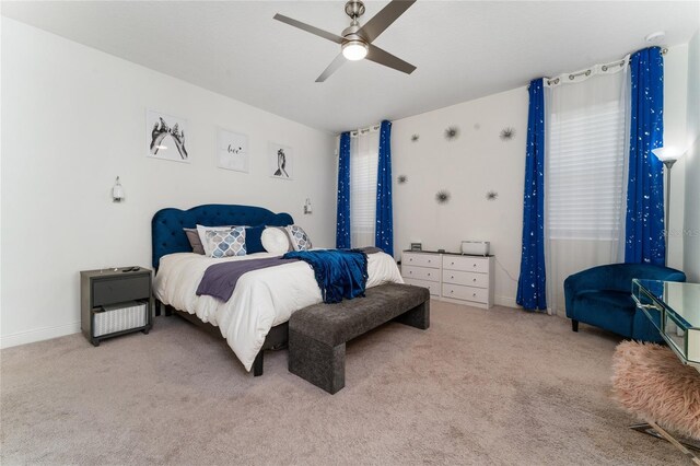 bedroom featuring carpet floors and ceiling fan