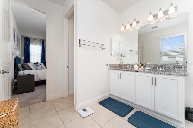 bathroom featuring vanity and tile patterned floors