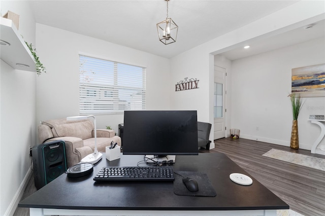 home office with dark wood-type flooring