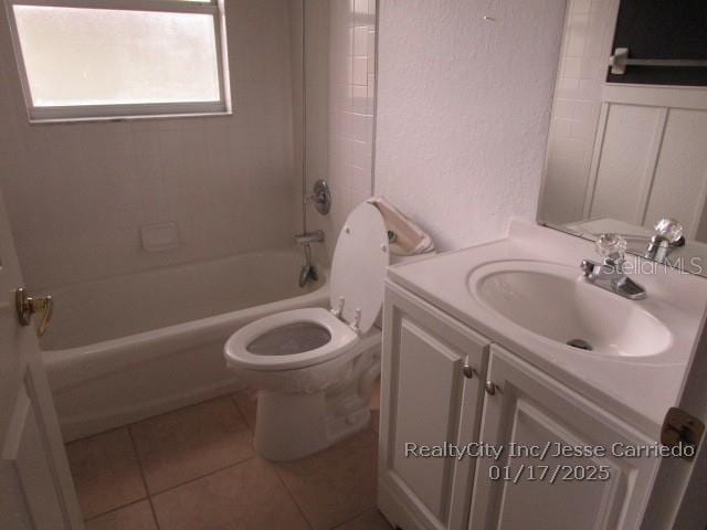 full bathroom with vanity, tile patterned flooring, bathtub / shower combination, and toilet