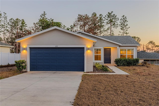 ranch-style house with a garage