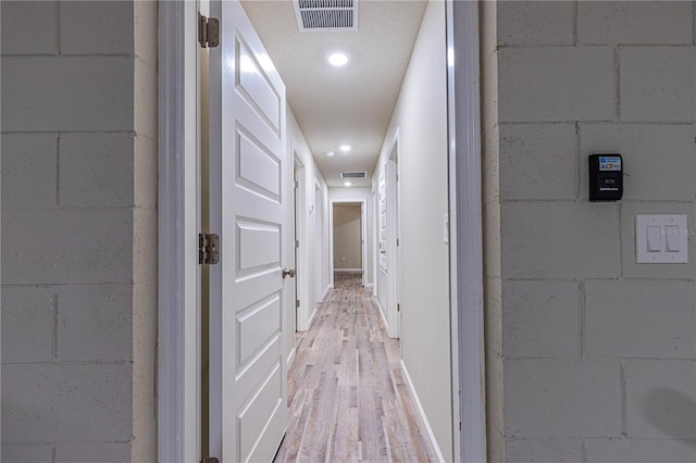 hall featuring light hardwood / wood-style flooring