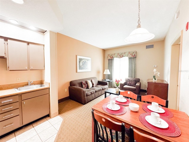 tiled dining space with sink