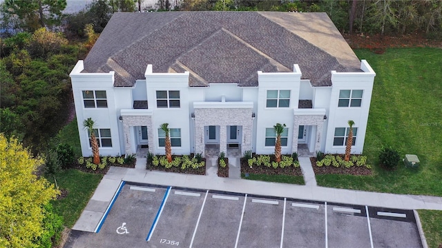 view of front of home with a front lawn