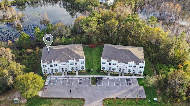 drone / aerial view featuring a water view