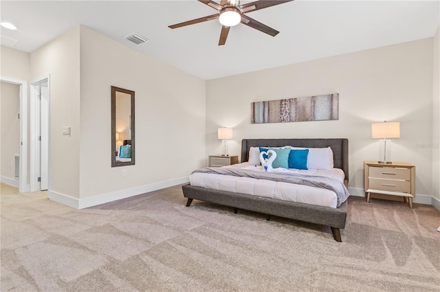 carpeted bedroom with ceiling fan