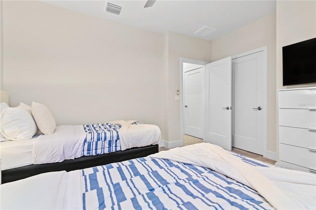 bedroom featuring ceiling fan and a closet