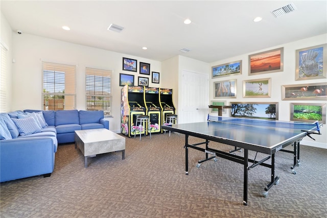 game room featuring dark colored carpet