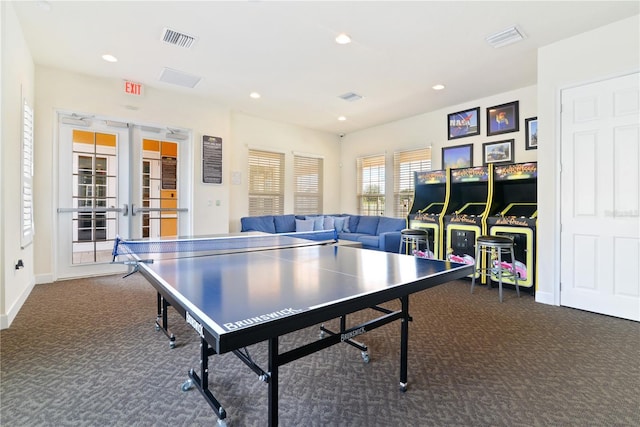 playroom featuring dark carpet and french doors