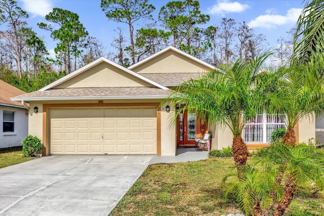 single story home featuring a garage