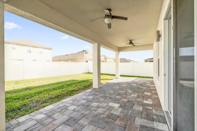 view of patio / terrace featuring ceiling fan