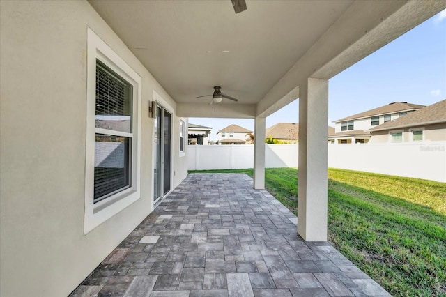 view of patio / terrace featuring ceiling fan