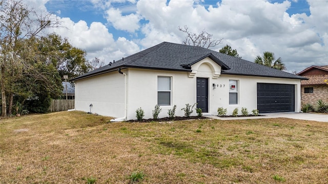 ranch-style house with a garage and a front lawn