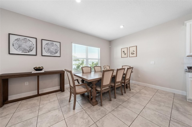 dining room with light tile patterned floors