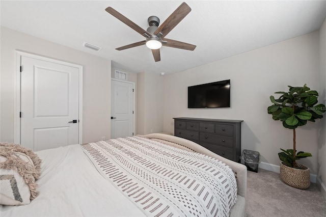 carpeted bedroom with ceiling fan