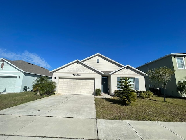 single story home with a garage and a front yard