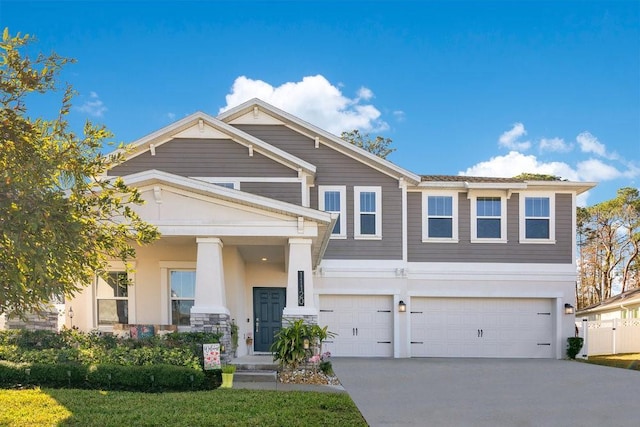 view of front of property with a garage