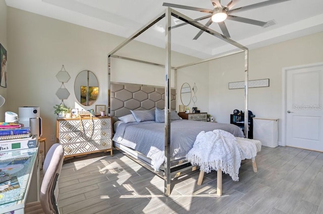 bedroom featuring wood finish floors