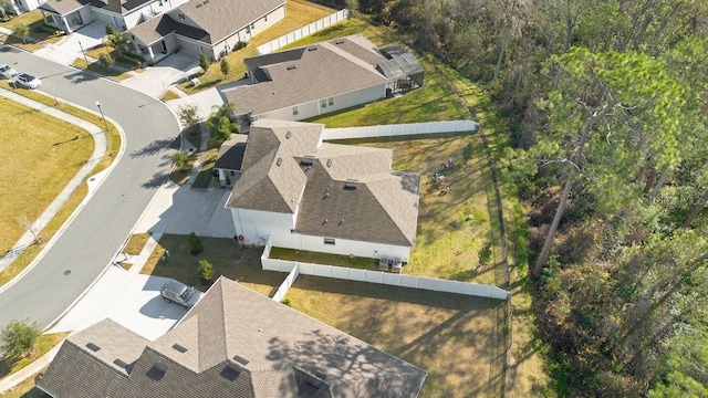 birds eye view of property with a residential view