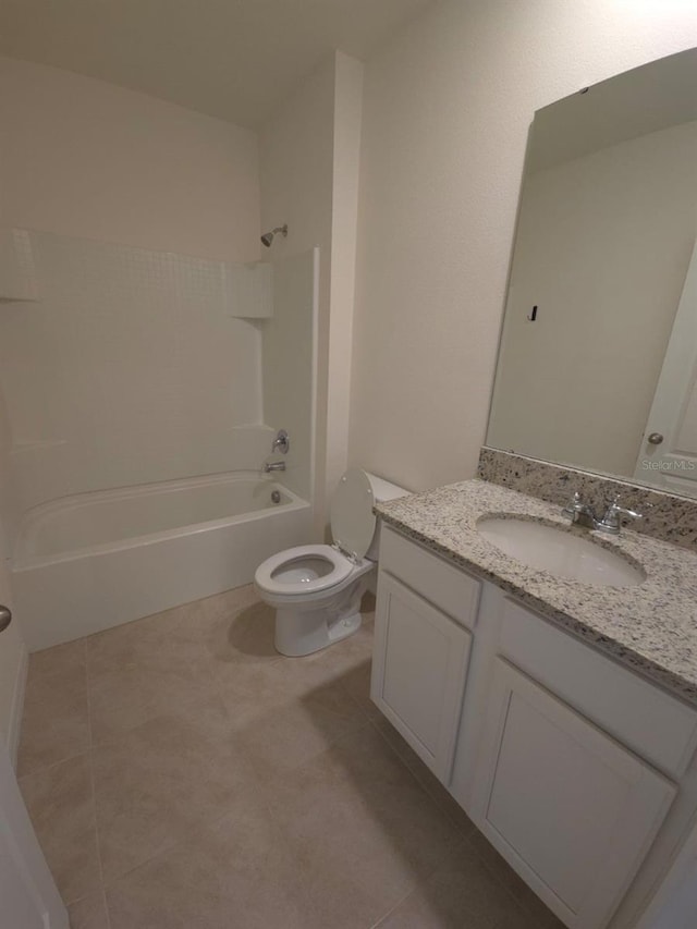 full bathroom featuring vanity, tile patterned flooring, toilet, and shower / bath combination