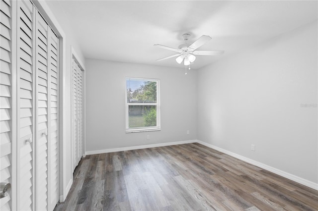 unfurnished bedroom with hardwood / wood-style flooring and ceiling fan