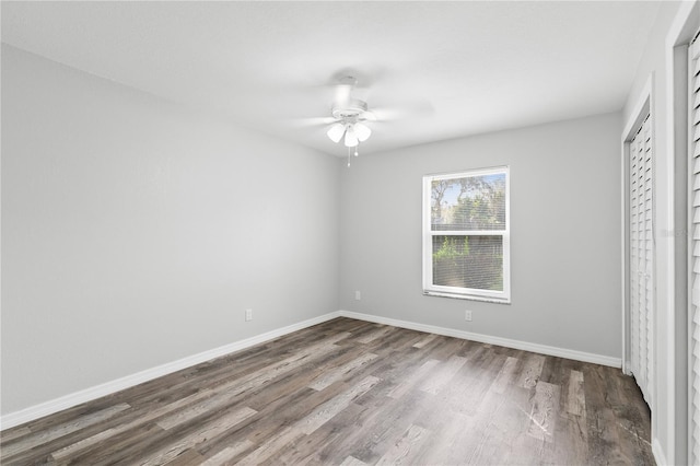 unfurnished bedroom with hardwood / wood-style floors and ceiling fan