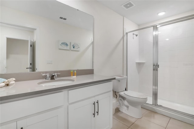 full bathroom featuring a stall shower, tile patterned flooring, visible vents, and toilet