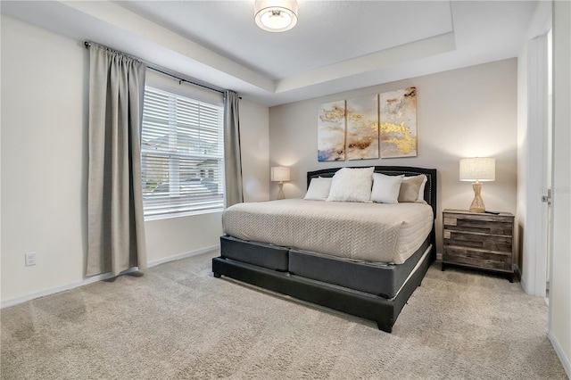 2186 Fleming Mist Pl, Kissimmee, FL 34747 - bedroom with carpet flooring and a tray ceiling