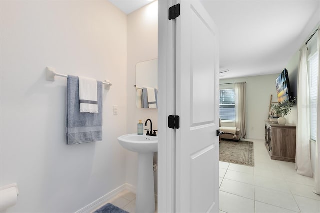 bathroom with sink and tile patterned floors