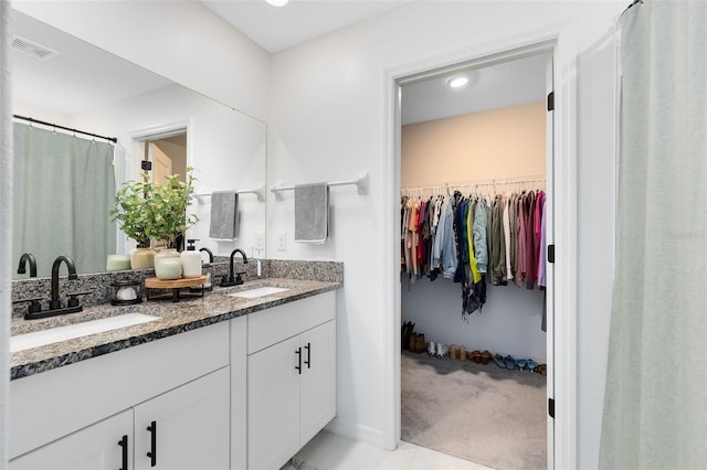 bathroom featuring vanity