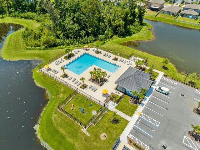 bird's eye view with a water view