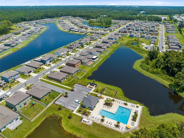 bird's eye view with a water view