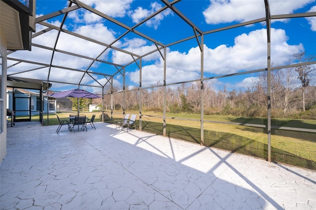 view of patio with a lanai