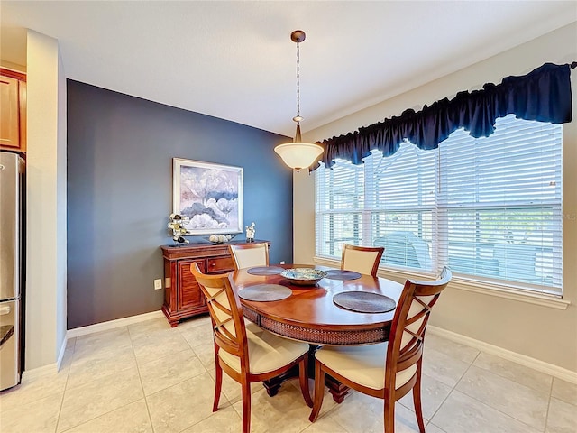 dining room with light tile patterned floors