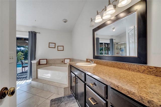 2417 Liela Lee Ct, Ocoee, FL 34761 - bathroom featuring vanity, tile patterned flooring, vaulted ceiling, and shower with separate bathtub