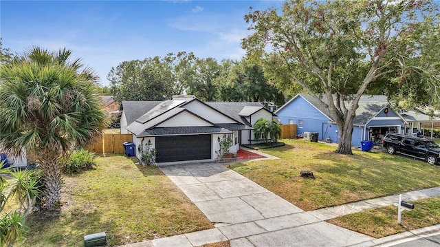 2417 Liela Lee Ct, Ocoee, FL 34761 - view of front facade with a garage and a front lawn