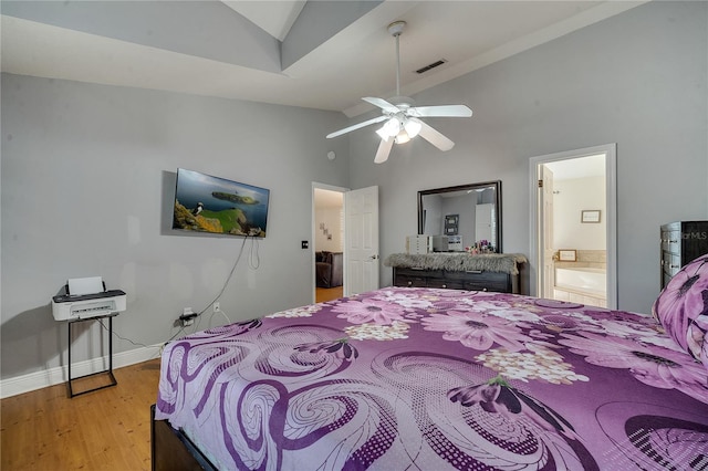 2417 Liela Lee Ct, Ocoee, FL 34761 - bedroom featuring high vaulted ceiling, connected bathroom, and hardwood / wood-style floors