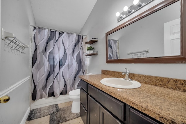 2417 Liela Lee Ct, Ocoee, FL 34761 - full bathroom with lofted ceiling, shower / tub combo with curtain, vanity, tile patterned floors, and toilet