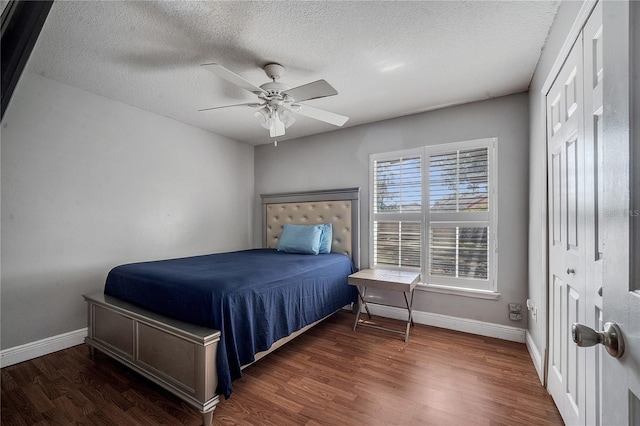 2417 Liela Lee Ct, Ocoee, FL 34761 - bedroom featuring ceiling fan, a textured ceiling, and dark hardwood / wood-style flooring