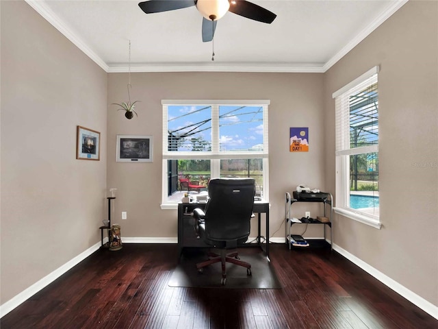 office space featuring ornamental molding, wood-type flooring, baseboards, and a ceiling fan