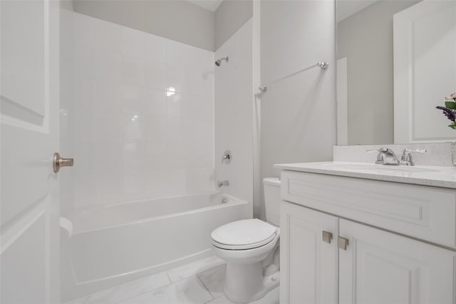 full bathroom with tiled shower / bath, vanity, and toilet