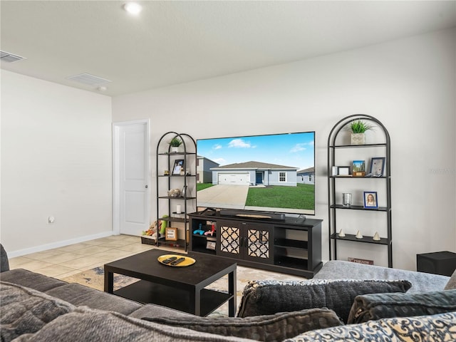 living room with light tile patterned flooring