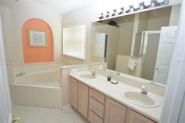 bathroom featuring vanity and separate shower and tub