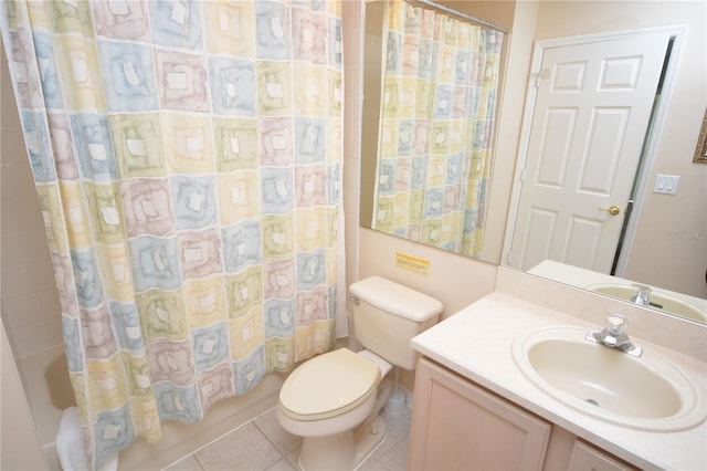 full bathroom featuring tile patterned flooring, toilet, vanity, and shower / bath combo with shower curtain