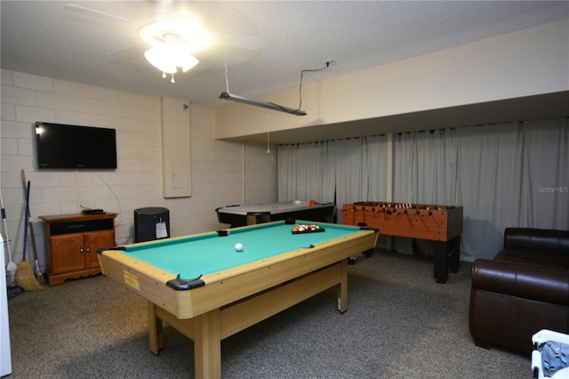 rec room with carpet flooring, a textured ceiling, and billiards