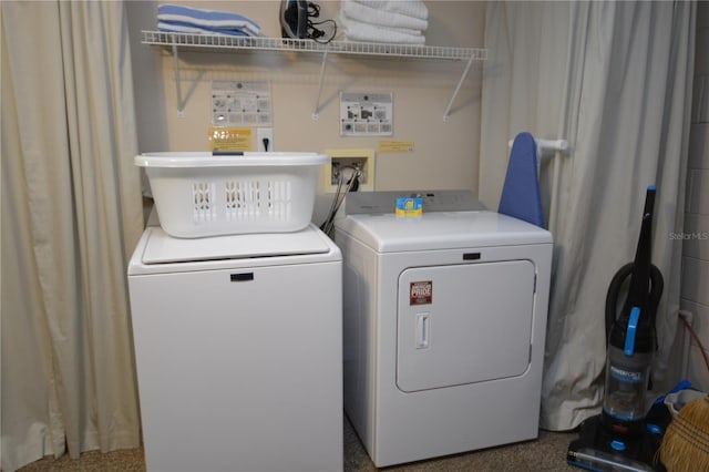 laundry room featuring washing machine and dryer