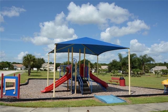 view of play area featuring a lawn