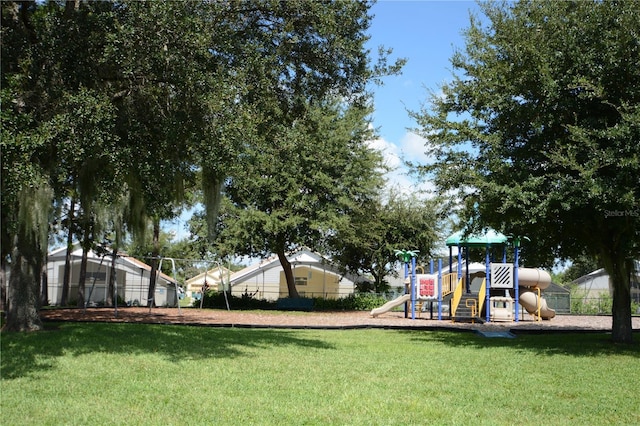 view of playground featuring a lawn