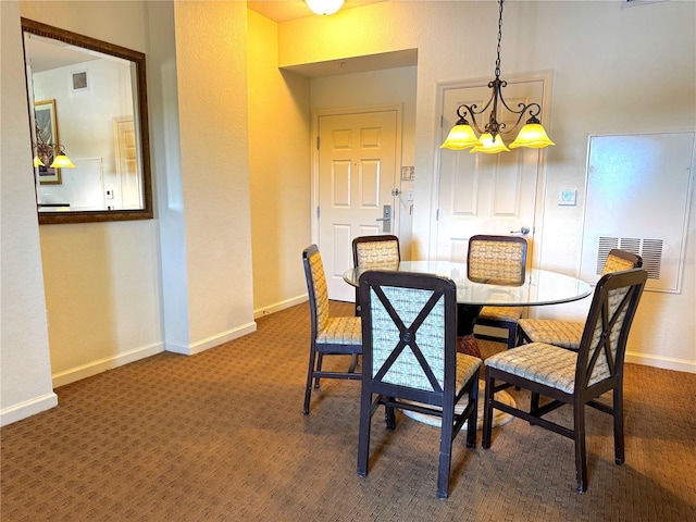 8100 Poinciana Blvd Unit B2/U2511, Orlando, FL 32821 - dining area with baseboards, visible vents, and carpet