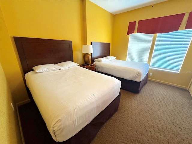 8100 Poinciana Blvd Unit B2/U2511, Orlando, FL 32821 - carpeted bedroom with baseboards